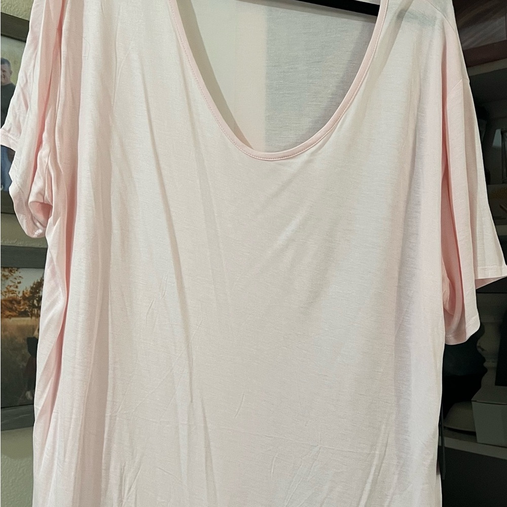 Pinkish blush top, too long for me, I'm short.